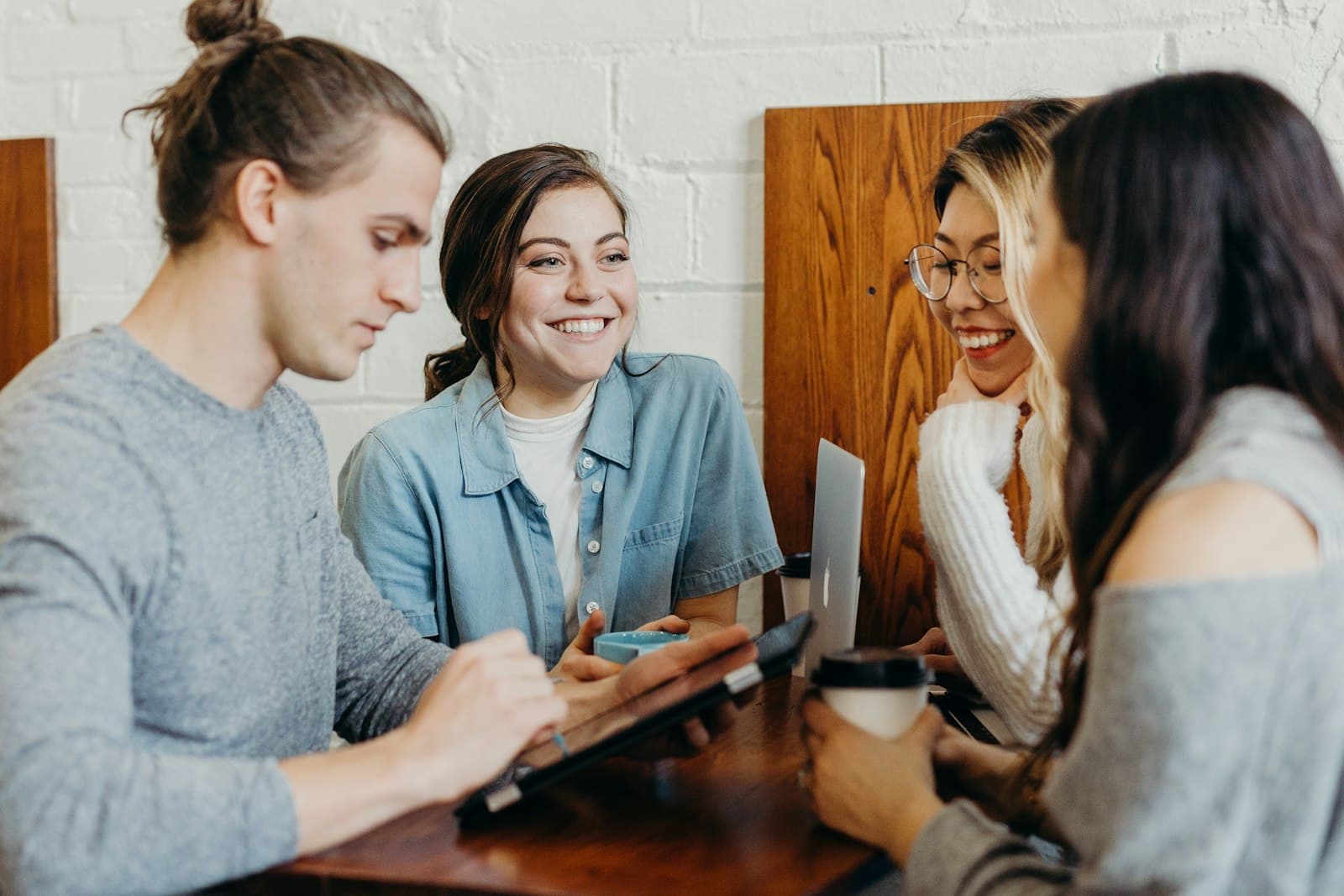 A group talking together around a table